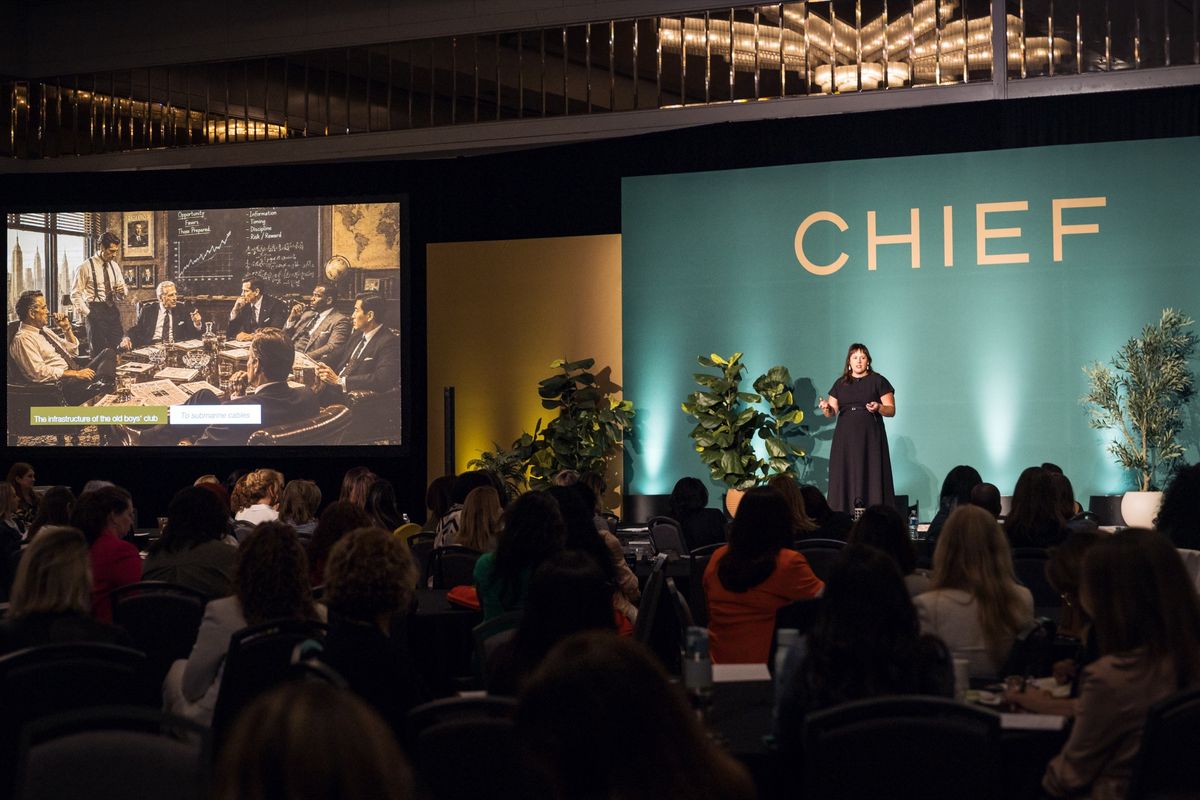 Amanda Worsfold speaking to a packed room at ChiefX