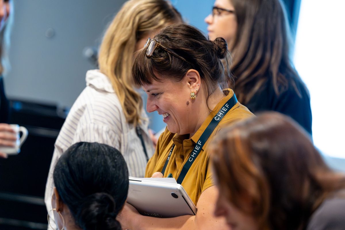Amanda Worsfold working hands-on with leaders during an AI session